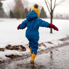 Whether it's rain, snow or slush, get outside in all-weather with our Cozy-Dry Play Suit!    100% Waterproof: Waterproof rating of 10000mm with fully taped seams and inner membrane  Windproof & Breathable: Fabric active breathability of 5000g/m2/24h   Fleece-Lined: Fully fleece-lined. Temperature rating: -5℃  Gro-With-Me®: Generously sized with adjustable hood, waist, and elasticized cuffs   Non-Toxic: Biodegradable Bionic-Finish® Eco DWR coating, PVC and fluorine free   Back to Cozy-Dry Rain Su Snow Play, Rainy Winter, Rain Suits, Play Suit, Rain Suit, Snow Rain, Kids Fleece, Rain Pants, Rain Gear