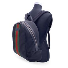 Unisex Backpack By Gucci, Crafted In Durable Black Techno Canvas.It Features Green/Red/Green Stripes On Th Front.Upper Zipper Closure.1 Side Zipper Pocket Inside.Adjustable Backstraps.'Gucci - Made In Italy' Tag (With Serial Number On Its Reverse).Retail Price Is 1510 Euros Condition A+ - Mint In Excellent Condition.Please Check The Photos Carefully And Ask If You Need To Know More Details Or If You Have Any Doubts.Details Material: Cloth Color: Black Model: N.A.Gender: Unisex Adults Country Of Manufacture: Italy Size: Medium Fabric Type: N.A.Material Processing: N.A.Material Effect: N.A.All Applique: No Appliques Handle Style: Shoulder Strap Design: Solid Colour Bags Handles: N.A.Bags Shoulder Strap: Dual Straps Bags Closure: Zipper Closure Bags Bottom: N.A.Bags Pockets: Internal Pocket B Chanel Backpack, Red Backpack, Grey Backpacks, Backpack Pattern, Unisex Backpack, Blue Backpack, Strap Design, Pocket Bag, Gucci Black