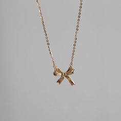 💎 Materials: 18k Gold Plated over Solid Sterling Silver Body - Hypoallergenic and Tarnish-Free 📐 Length: 40cm + 5cm extension Ribbon Pendant Necklace, Gold Bow Jewelry, Ribbon Bow Necklace, Bow Necklace Gold, Gold Bow Necklace, Ribbon Necklace With Pendant, Gold Dainty Jewelry, Ribbon Necklaces, Ribbon Aesthetic