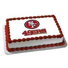 a cake with the san francisco 49ers logo on it