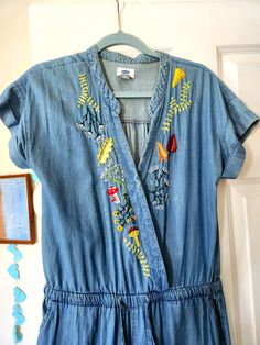 Hand Embroidered Chambray Denim Jumpsuit (Old Navy Size Small) One of a kind!! This hand embroidered piece is a US women's small, full legged and short sleeved jumpsuit. Chambray denim, medium blue. Jumpsuit features embroidered mushrooms, plants, leaves, and botanicals. Spring Cotton V-neck Denim Jumpsuit, Spring V-neck Cotton Denim Jumpsuit, Embroidered Mushrooms, Womens Denim Jumpsuit, Plants Leaves, Upcycle Ideas, Womens Jumpsuits, Blue Jumpsuit, Embroidery Hand