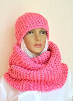 Pink, warm and soft women's hand made snood - scarf and hat set hand knitted from fine merino wool yarns. Hat edges are decorated with crochet hook. Comfortable to wear, very soft and thick hat and snood scarve set. These scarf and hat will warm you up in cold winter or autumn time. Accurately hand knitted from high quality yarns, so, set is durable and easy to maintain. Also it's available hand knitted works according to your model and size. SIZE: universal, scarf length: 52'' (133 cm), width: Handmade Knit Scarves For Winter, Handmade Beanie As Winter Gift, Handmade Beanie For Winter Gift, Handmade Wool Crochet Hat For Winter, Pink Knitted Scarves For Winter, Handmade Pink Knitting Pattern For Winter, Pink Knitted Winter Scarves, Handmade Winter Knitting Pattern In Pink, Winter Crochet Knitting Pattern For Gift