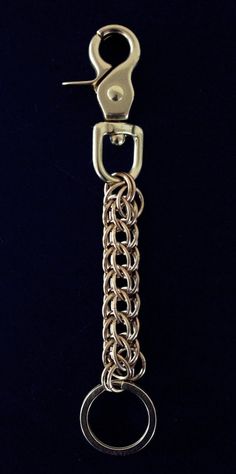 These key chains are hand woven link by link. The weave is made using the finest jewelers brass or stainless steel we can get our hands on and finished with either brass or nickel top quality trigger clasps. Comes with a key ring at the end. Heavy duty and built to last, this chain will not rust or fall apart. Great to wear on your belt loop or connect to a bag to secure your keys. *Measures 6.5 inches (16.5 cm) in total length *16 gauge brass or stainless steel rings weaved in a Persian design Bronze Metal Bracelets With Lobster Clasp, Bronze Metal Bracelet With Lobster Clasp, Yellow Gold Brass Chain Bracelet With Lobster Clasp, Gold Box Chain Jewelry For Everyday Use, Everyday Metal Link Jewelry, Bronze Metal Link Jewelry, Mens Leather Accessories, Wallet Chains, Motorcycle Club