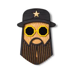 a wooden mask with sunglasses and a hat on it's head, made to look like a bearded man