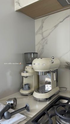 a coffee maker sitting on top of a kitchen counter