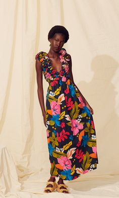 Bold blooms: our Zaira dress is cut from a beautiful Hawaiian floral print. With ruffle straps, bow closure, and open back- Zaira is packed with detail. And the best part- she has pockets! Reach for Zaira on a warm summer day to make a bold statement.  • Hawaiian Hibiscus Poplin • Self: 100% Cotton • Unlined • Tie at center back • Stretchy, elastic smocking in bust • Dry clean only • Imported, India • Model is 5'11" and wears a size x-small  Size Chart Hawaiian Floral Print, Hawaiian Hibiscus, Nye Outfits, Daytime Dresses, Vacation Dresses, Feminine Design, Bag Dress, Summer Day, Spring Collection