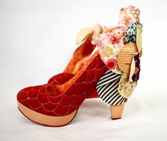 Vintage 2000's "Sweety Bird" platform pumps by Irregular Choice. Beautiful red suede shoes have a dramatic flower appliqué at the heels, made with fabric petals in a mix of prints. Velvet interior, metallic leather side. Like new, with original box. Very Good condition, size 9 ½.  SIZE 9.5 US/ 40.5 EU CONDITION Very Good To view more vintage items, follow the link below to my shop: https://www.MinkyVintage.etsy.com Fabric Petals, Red Suede Shoes, Velvet Interior, Irregular Choice, Velvet Interiors, Red Heels, Flower Applique, Red Suede, Floral Applique