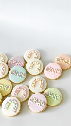 decorated cookies with the word love spelled in cursive writing on them are arranged next to each other