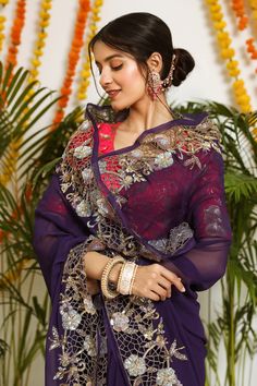 Dark purple pure georgette saree with intricate cutwork and sequins hand embroidered motifs. Paired with embroidered blouse.
Component: 2
Pattern: Embroidered
Type Of Work: Floral
Sleeve Type: Short Sleeves
Fabric: Pure Georgette
Color: Purple
Other Details: 
Floral motifs
Cutwork panels
Occasion: Sangeet - Aza Fashions Eid Georgette Pre-draped Saree With Intricate Embroidery, Purple Georgette Pre-draped Saree For Festivals, Embroidered Purple Georgette Pre-draped Saree, Navratri Organza Blouse Piece With Intricate Embroidery, Purple Georgette Pre-draped Saree For Eid, Designer Georgette Blouse With Intricate Embroidery, Georgette Saree Choli With Intricate Embroidery, Purple Georgette Blouse With Intricate Embroidery, Festival Georgette Blouse Piece With Intricate Embroidery