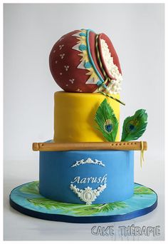 there is a cake made to look like it has peacocks on top