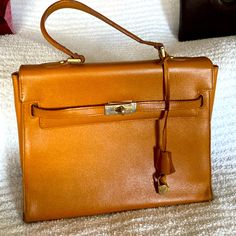 Almost Fainted When I Found This Beauty. Did The Research Its Circa 1980s Saks Fifth Ave Made In Italy, Real Leather Super Birkenese Lol. Pre-owned Satchel For Formal Occasions, Vintage Pre-owned Formal Bags, Formal Pre-owned Rectangular Shoulder Bag, Pre-owned Top Handle Bags For Formal Occasions, Vintage Pre-owned Satchel Bag, Vintage Tan Shoulder Bag For Travel, Vintage Tan Rectangular Satchel, Vintage Rectangular Tan Satchel, Vintage Tan Satchel Shoulder Bag