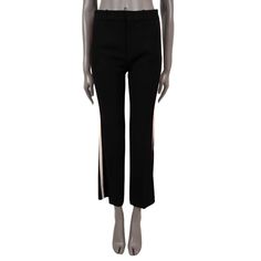 100% authentic Gucci stretch cady pants in black viscose (with 3% elastane). Features boot cut, cropped legs, ivory and red grosgrain side stripe, two slant pockets and two button back pockets. Open with a concealed hook and zipper. Has been worn and is in excellent condition. Matching blazer available in separate listing. 2019 Pre-Fall Measurements Tag Size 38 Size XS Waist From 72cm (28.1in) Hips From 90cm (35.1in) Length 98cm (38.2in) Inseam 72cm (28.1in) All our listings include only the lis Gucci Straight Leg Bottoms With Five Pockets, Gucci Fitted Straight Pants, Gucci Straight Workwear Pants, Gucci Designer Fitted Pants, Gucci Luxury Full-length Pants, Gucci Black, Side Stripe, Zipper, Gucci