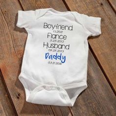 a baby's bodysuit that says boyfriend, fiance, husband and daddy on it