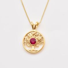 Ruby Tree of Life Pendant set with a Created Ruby in top grade, perfect diamond cut & intense red color.Gold Vermeil - 18K Gold plating over Solid 925 Sterling Silver.Matching Ring & Earrings - please ask meDetails:• Created Ruby in a flawless clarity• Ruby: 5mm, 0.5 Ct, round cut• Dimensions: Pendant Height 23.5mm, Width 16.5mm• Free Complimentary Chain• 18k Gold VermeilSKU 2849 Diamond-cut Ruby Jewelry As Gift, Diamond-cut Ruby Jewelry For Gifts, Diamond Cut Ruby Jewelry As Gift, Yellow Gold Jewelry With Lab-created Ruby For Gift, Gift Jewelry With Diamond Cut Lab-created Ruby, Red Diamond-cut Necklace For Anniversary, Gift Jewelry With Lab-created Ruby In Round Cut, Gift Jewelry With Lab-created Ruby, Round Cut, Gift Lab-created Ruby Jewelry With Round Cut