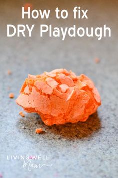 an orange substance on the ground with text overlay how to fix dry playdouh