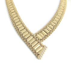 Vintage Diamond Fancy Link Chevron Necklace 14K Yellow Gold 28.50 Gr This is a beautiful necklace. Please let us know if you have any questions :) Diamonds: 7 round brilliant cuts .22 ctw, G, SI1 Metal: 14K yellow gold Weight: 35.73 grams Stamped: NA (x-ray tested) Length: 16.5 inches Width: 8.5 mm - 16.4 mm Clasp: snap with safety latch Formal Baguette Diamond Necklaces, Gold Necklaces With Baguette Diamonds, Formal Gold Diamond Necklace With Baguette Diamonds, Elegant Gold Necklace With Baguette Diamonds, Elegant Gold Necklaces With Baguette Diamonds, Classic Gold Diamond Necklace With Baguette Diamonds, Timeless Gold Necklace With Baguette Diamonds, Formal 14k Gold Necklace In Diamond White, Formal Diamond White 14k Gold Necklaces