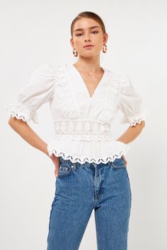 Add some romance to your style with this captivating combination lace top. With a v neckline and half sleeves, this top is perfect for dressing up or down. The hidden zipper gives you a touch of sexiness, while the cropping peplum hem adds a touch of femininity. Pair it with your favorite jeans or skirt and wear it out on the town. You'll love feeling romantic and sexy in our Ever Romantic Combination Lace Top. Combination lace V neckline Zipper Non sheer Lining Half sleeves Cropped peplum Shell Eyelet Lace Top, Jumpsuit Fall, Love Feeling, Knit Bottom, Tweed Dress, Peplum Hem, Blazer And Shorts, Heat Styling Products, Eyelet Lace