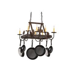 an old fashioned chandelier with pots and pans hanging from it's arms