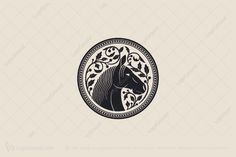 the head of a horse in a circle with leaves on it's forehead logo for sale