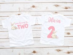 Processing of your order takes 4-9 business days, then shipping is First Class so allow another 3-6 business days.  Find matching Mom/Dad/Family Shirts here: https://www.etsy.com/listing/1670309169/some-bunnys-family-t-shirts-spring-bunny?click_key=d89e7e3fb83ca2213907c04e38da2e72b1771c9f%3A1670309169&click_sum=284dd3d8&ref=shop_home_active_2&pro=1&sts=1 Now the whole family can get in on the Birthday Fun! All Shirts/Bodysuits are printed using DTG (Direct To Garment) printing. This is where the Some Bunny Is Two, 2nd Birthday Girl, 2nd Birthday Shirt, Rosa Gold, Spring Birthday, Girl 2nd Birthday, Matching Mom, Spring Bunny, Birthday Girl Shirt