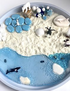 a plate with sand and sea animals on it