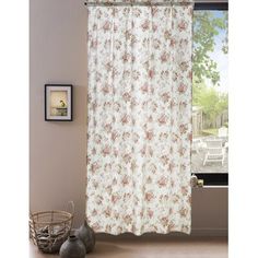 a white curtain with pink flowers on it