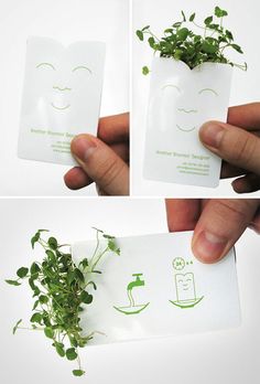 there is a plant growing out of a card