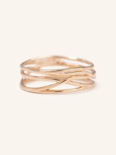 A modern and timeless take on the classic wedding band. The Twisted Vine Ring is crafted out of solid 14K gold. It is a twisted wide ring with a delicate entwined design to make it a contemporary wedding band. Vine Ring, Classic Wedding Band, Wide Ring, Contemporary Wedding, Wide Rings, Solid Gold Rings, Classic Wedding, Exquisite Jewelry, Jewelry Care