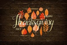 happy thanksgiving greeting card with autumn leaves on wood background - miscellaneous objects / arts crafts