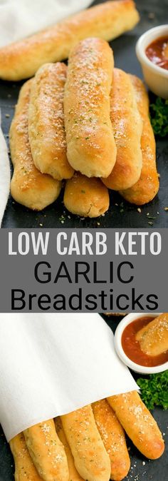 low carb keto garlic breadsticks on a black surface with dipping sauce