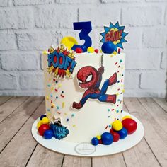 a birthday cake with the number three on it