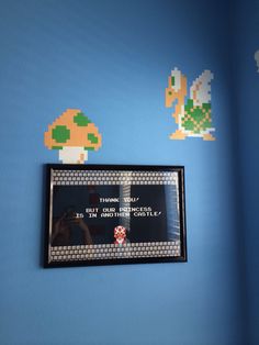 a video game themed wall hanging in a child's room