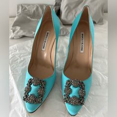 Gorgeous Sky Blue/Turquoise Color, Satin. No Flaws Or Signs Of Wear Except The Sole- Only Worn Once To An Event. 4” Heel. Original Box And 2 Protective Bags. Luxury Embellished Blue Heels, Elegant Turquoise Evening Heels, Elegant Turquoise Heels For Party, Designer Blue Heels For Wedding, Elegant Turquoise Party Heels, Manila Blahnik, Blahnik Shoes, Manolo Blahnik Shoes, Turquoise Color