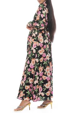 The Saliah mockneck blouson sleeve maxi dress is a classic staple piece for your wardrobe. This maxi dress features mockneck with shirring detail, dramatic blouson sleeves, elastic waist with waistband, and full maxi skirt. 55.5" length (size XS) Mock neck Back closure Long blouson sleeves Allover floral print Lined 97% polyester, 3% spandex Machine wash Imported Model stats: 5'10" height, 32" bust, 25" waist, 36" hip. Model is wearing size 4 Full Maxi Skirt, Blouson Sleeve, Sleeve Maxi Dress, Maxi Dress With Sleeves, Staple Pieces, Sleeve Dress, Mock Neck, Nordstrom Rack, Maxi Skirt