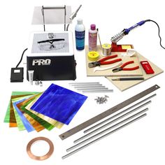 the complete kit is ready to be used for making art projects with supplies such as paper, scissors, glue, tape and other items