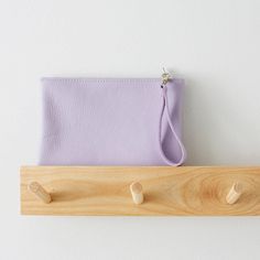 Our Lilac leather clutch bag is perfect for any event where you need a stylish clutch bag to store you essentials in. It comes with a detachable wrist strap that is fastened with a lobster clip - for easy removal when you are wanting to have a handheld clutch bag option.   We also offer this clutch bag on its own or with the option to add a matching card holder to go inside the bag, to keep all your cards in one place.  Made from high quality soft Italian lilac leather and a YKK zip fastening. Pouch Clutch With Card Slots, Daily Use Soft Leather Pouch Clutch, Soft Leather Clutch Wallet, Soft Leather Handheld Clutch For Daily Use, Daily Use Soft Leather Handheld Clutch, Daily Use Handheld Soft Leather Clutch, Smooth Grain Clutch Pouch For Daily Use, Soft Leather Pouch Clutch Gift, Soft Leather Pouch Clutch As Gift