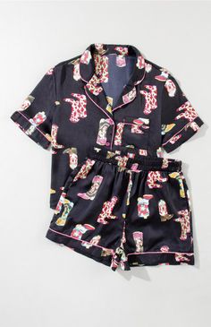 Western boots print for a stylish look Comfortable shift style pajama set Two-piece design for easy mix and match Perfect for lounging or sleeping Boots Print, Black Western Boots, Black Cowgirl Boots, Black Cowgirl, Boot Print, Satin Pyjama Set, Satin Pajamas, Short Pajama Set, Pajama Shorts