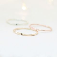 The Wave Initial Ring Our slim 1.3 mm band is hand formed, soldered, hammered and stamped with your tiny initial or monogram (up to 3 characters). Wear one, or stack them for all your loves. ♥ This listing is for one ring; add multiple quantities to your cart for more. {DETAILS}: * 1.3 mm band (2 mm where initial sits) * 1.5 mm initial * your choice of sterling silver, 14k gold fill, rose gold fill or solid 14k gold! ►Lots more stacking rings for...stacking! http://etsy.me/1U0RlXp ►Silver heart Personalized Initial Ring, Sterling Silver Stacking Rings, Letter Ring, Stacking Bands, Personalized Ring, Initial Ring, Minimalist Ring, Personalized Rings, Personalized Initials