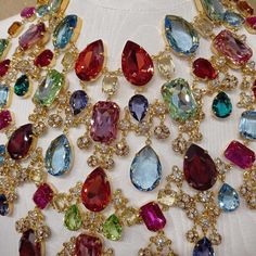 For Sale on 1stDibs - Fantastic masterpiece by Carlo Zini One of the world greatest bijoux designers Large collier Stunning ramage of class colored crystals drops Amazing color Multicolor Party Necklaces With 17 Jewels, Elegant Multicolor Crystal Embellished Jewelry, Multicolor Crystal Necklace With Rhinestones, Multicolor Teardrop Stone Necklace, Elegant Multicolor Rhinestone Necklaces, Elegant Multicolor Jeweled Crystal Necklaces, Multicolor Teardrop Crystal Jewelry, Multicolor Crystal Teardrop Jewelry, Party Multi-stone Crystal Necklace