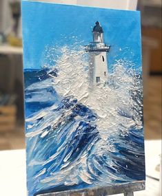 a painting of a lighthouse in the ocean