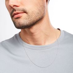 Enjoy a versatile design that complements every style and occasion - this simple and elegant white gold Singapore chain necklace from the Made in Italy Collection. Crafted in 14K white gold This 1.0mm-wide Singapore chain is certain to become your favorite go-to look. Lovely worn alone or layered with other chains, necklaces and pendants This necklace adjusts up to 22.0 inches in length with a sliding bead extender and secures with a lobster claw clasp. White Gold Sterling Silver Cable Chain Necklace, 14k Gold Silver Chain Necklace With Delicate Chain, 14k Gold Delicate Chain Necklace In Silver, 14k Gold Delicate Silver Chain Necklace, Minimalist Sterling Silver Chain Necklace In White Gold, Classic White Gold Chain Necklace With Delicate Chain, White Gold Sterling Silver Rolo Chain Necklace, Minimalist Sterling Silver White Gold Chain Necklace, Minimalist White Gold Sterling Silver Chain Necklace