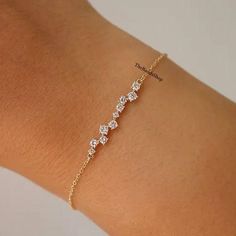 10k Gold Cluster Dainty Bracelet, Constellation Diamond Wedding Bracelet, Sparkling Round Cut Lab Grown Diamond Bracelet, Tennis Bracelet   ✹✹𝐖𝐞𝐥𝐜𝐨𝐦𝐞 𝐭𝐨 𝑻𝒉𝒆𝑩𝒂𝒏𝒅𝒔𝑺𝒉𝒐𝒑✹✹ ★ 𝑺𝒕𝒐𝒏𝒆𝒔 𝑫𝒆𝒕𝒂𝒊𝒍𝒔 ★ ● Stone Shape:- Round Cut ● Stone Type:- Simulated Diamond, Moissanite, Lab-Diamond & Natural Diamond ● Stone Size:- 2.50 mm ● Color:- DEF ● Clarity: VVS-VS ● Cut Grade: Excellent ● Making Process: Handmade - Crafted by our experienced team ★ 𝑰𝒕𝒆𝒎 𝑫𝒆𝒕𝒂𝒊𝒍𝒔:- ☛ Metal Purity: Solid Gold (10KT, 14KT, 18KT); Silver(925 Sterling, 935 Argentium), 950 Platinum ☛ Metal Tone: Yellow, White, Rose ☛ Stamp/Hallmark: Yes ★ 𝑪𝒖𝒔𝒕𝒐𝒎𝒊𝒛𝒂𝒕𝒊𝒐𝒏:- ☛ Customized Design Jewelry. ☛ All cuts which you dream to make with moissanite. ☛ Updating every step of your ordered jewelry Repurposed Diamond Jewelry, Bracelet Diamond Design, Delicate Rose Gold Bracelet For Wedding, Delicate Rose Gold Wedding Bracelet, Adjustable Gold Bracelet With Cubic Zirconia For Wedding, Dainty Rose Gold Chain Bracelet For Wedding, Wedding Crystal Bracelet With Adjustable Chain, Dainty Party Jewelry With Bracelet Strap, Dainty Rose Gold Wedding Chain Bracelet