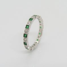 Vintage Sterling Silver Emerald & White Topaz Eternity Band Ring...Marked 925...Total of weights 1.7grams... Size 8...Measure of Face 2.9MM...It's in very good condition. A Eternity Band Ring, Eternity Band, 1980s Vintage, White Topaz, Eternity Bands, Quality Jewelry, Sterling Silber, Vintage Sterling Silver, Band Ring