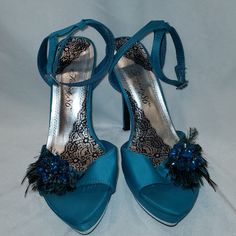 Nwot Wedding Dress Ready Teal Blue Peacock And Rhinestone High Heels Size 8.5 Heel Height 5 Inches From Smoke Free Pet Free Home Glamorous Blue High Heel Wedding Shoes, Blue Glamorous Wedding Shoes For Party, Glamorous Blue Heels For Weddings, Blue Rhinestone Wedding Shoes For Formal Occasions, Blue Wedding Shoes With Rhinestones, Blue Rhinestone Wedding Shoes, Blue Rhinestone Wedding Heels, Embellished Blue Heels For Gala, Blue Embellished Heels For Gala