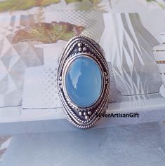 Welcome to SilverArtisanGift Shop , Benefits of Blue Chalcedony Stone , A creative stone, Blue Chalcedony imparts mental flexibility and verbal dexterity. It stimulates the ability to learn new languages and improves memory. Gives feelings of light-heartedness and optimism. Improves self-perception. Thanks for visiting my shop Blue Oval Moonstone Bohemian Ring, Blue Oval Moonstone Ring Bohemian Style, Blue Oval Moonstone Ring In Bohemian Style, Chalcedony Oval Cabochon Jewelry Gift, Unique Blue Moonstone Ring Gift, Blue Moonstone Ring Gift, Sagittarius Birthstone, Blue Chalcedony Ring, Chalcedony Stone