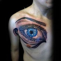 a man with an eye tattoo on his chest