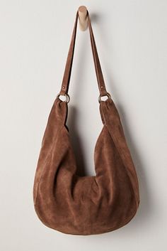 Shop our Roma Suede Tote Bag at FreePeople.com. Boho clothing for the creative spirit- free worldwide shipping. Chic Tote Shoulder Bag With Suede Lining, Chic Suede Hobo Bag With Removable Pouch, Chic Suede Hobo Bag With Suede Lining, Chic Suede Hobo Bag With Soft Leather, Chic Suede Tote Shoulder Bag, Chic Suede Hobo Bag With Adjustable Strap, Chic Suede Hobo Bag For Everyday, Chic Suede Hobo Bag With Leather Handles, Chic Suede Shoulder Bag For Everyday Use