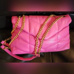 Fuschia Quilted Bag With Chain Straps. Everyday Pink Shoulder Bag With Chain Strap, Pink Crossbody Evening Bag With Chain Strap, Pink Evening Shoulder Bag With Chain Strap, Pink Pouch Bag With Chain Strap, Pink Pouch Shoulder Bag With Chain Strap, Pink Bags With Gold-tone Hardware, Chic Pink Bag With Chain Strap, Fashion Accessory Pouch Shoulder Bag With Chain Strap, Chic Pink Evening Bag With Chain Strap