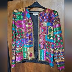 80s Nordstrom Multicolor Sequin Blazer Silk Lined Vintage Evening Party Jacket. Make A Bold Statement With This Piece Of Fashion History! This Vintage Party Jacket Is A Showstopper, Featuring Vibrant Sequins In A Striking Geometric Pattern And A Luxurious Silk Lining. Perfect For Special Occasions, Parties, Or Adding A Unique Piece To Your Vintage Collection. Details: Authentic 1980s Nordstrom Catalog Item Multicolored Sequin Design Luxurious Silk Lining Size Small Vibrant Geometric Pattern Perf Pink Long Sleeve Outerwear For Party Season, Retro Spring Outerwear For Party, Retro Spring Party Outerwear, Party Jacket, Multicolor Sequins, Evening Dinner, Party Jackets, Sequin Blazer, Sequin Design