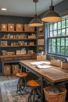 a large wooden table sitting in front of a window next to baskets and boxes on shelves